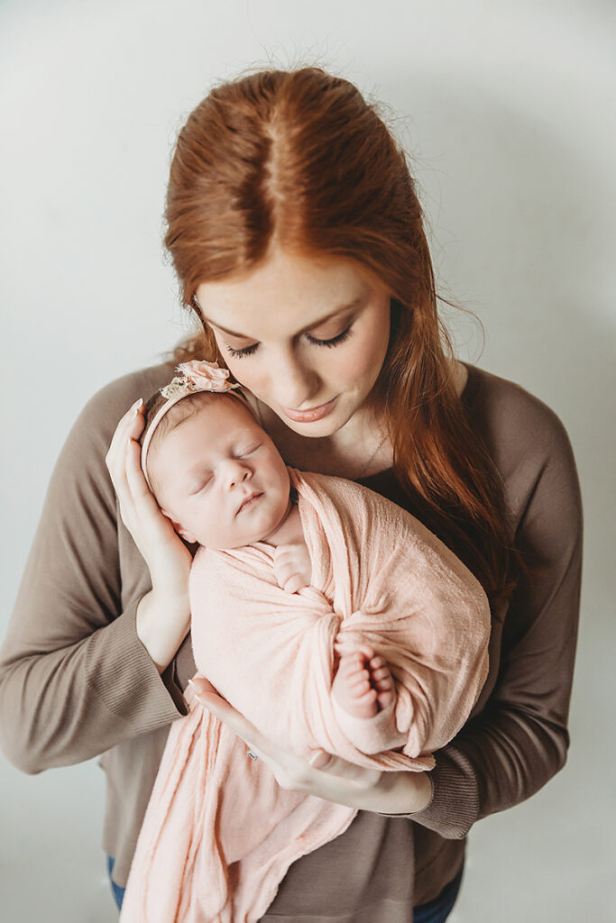 newborn baby with mom