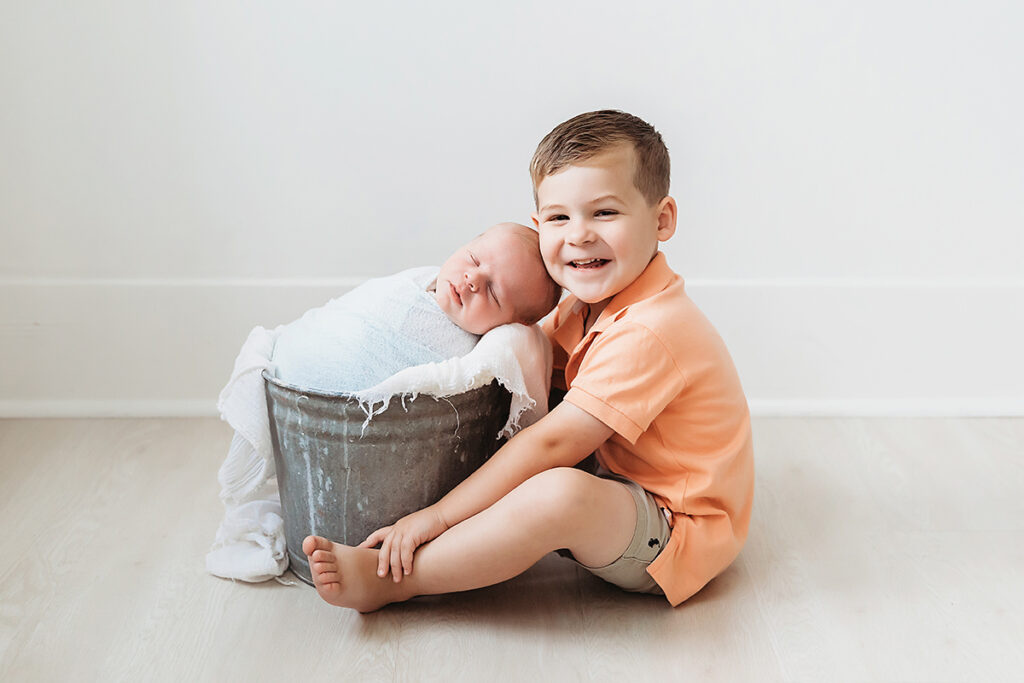 newborn baby with big brother