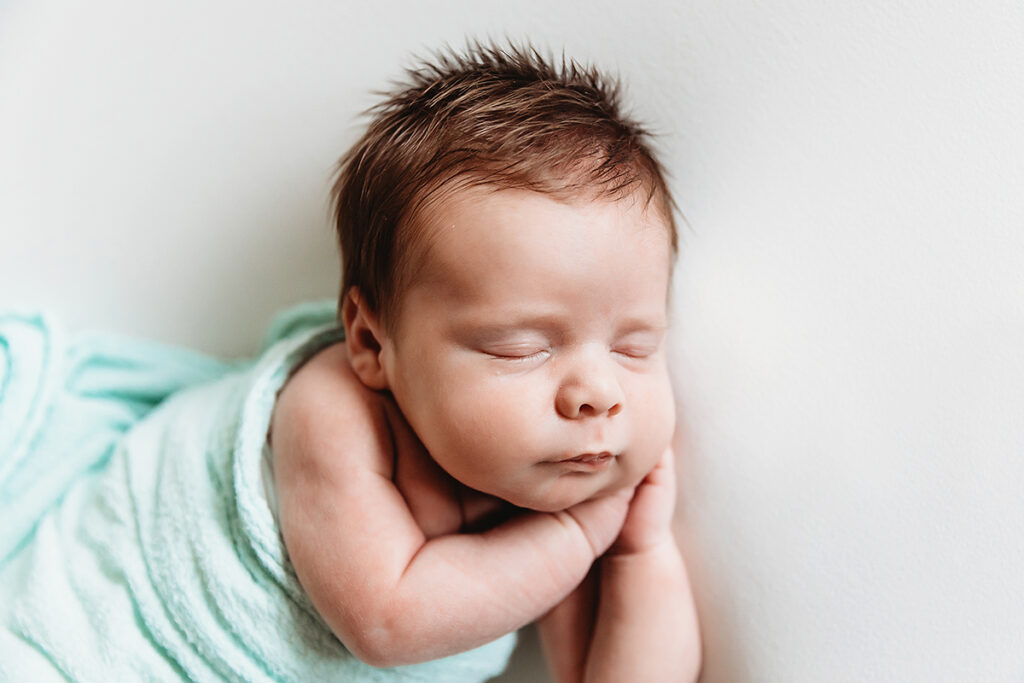 newborn baby with lots of dark hair