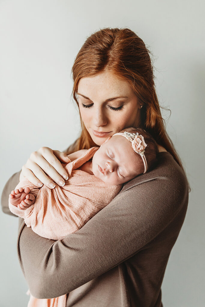 newborn baby with mom