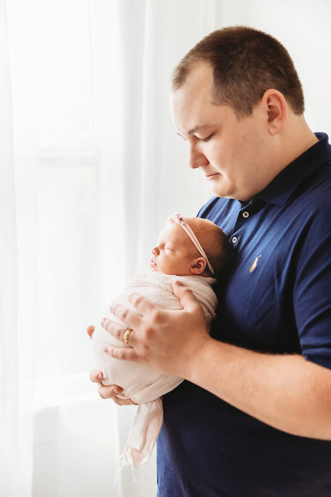 newborn baby with dad