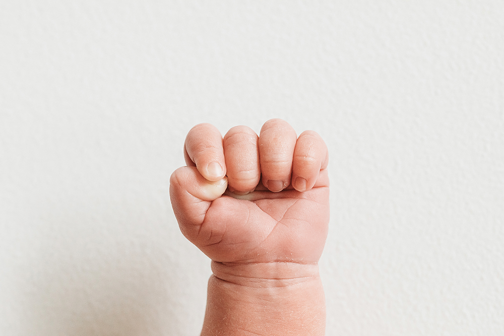 newborn baby hand macro