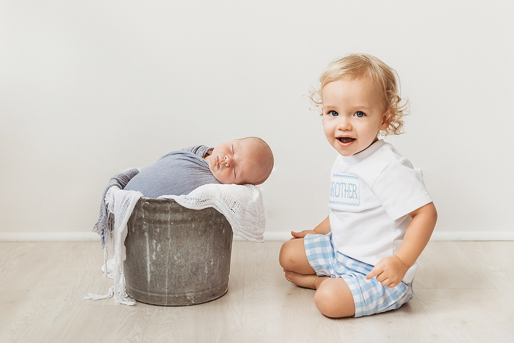 newborn baby with big brother