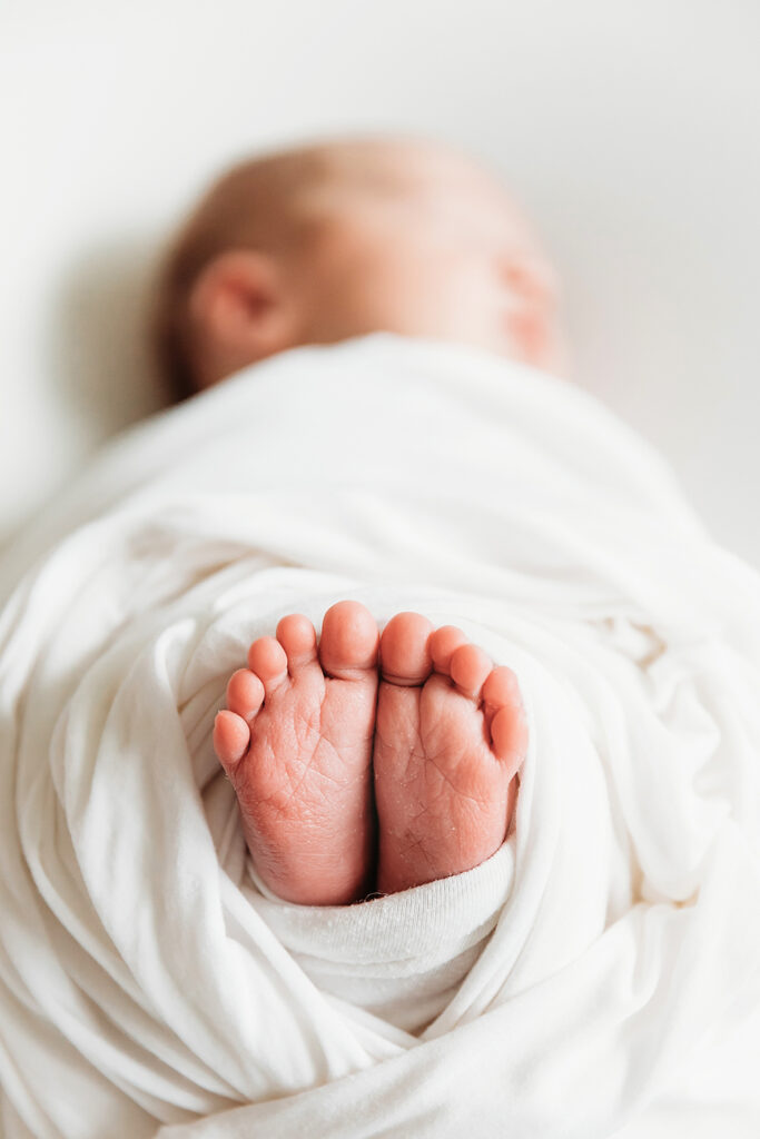 newborn baby feet closeup