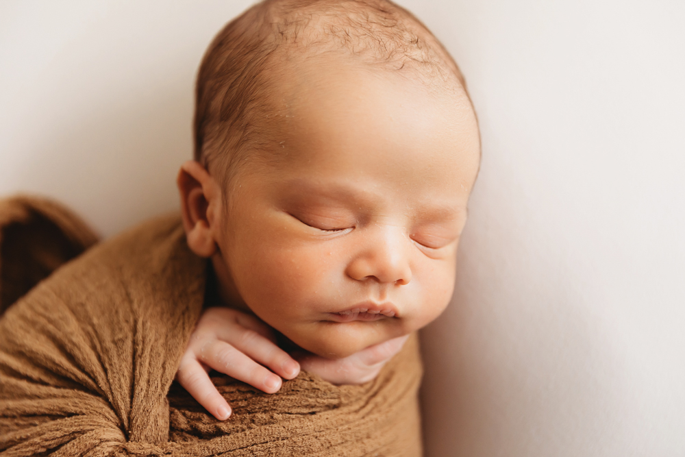 newborn sleeping baby photographer