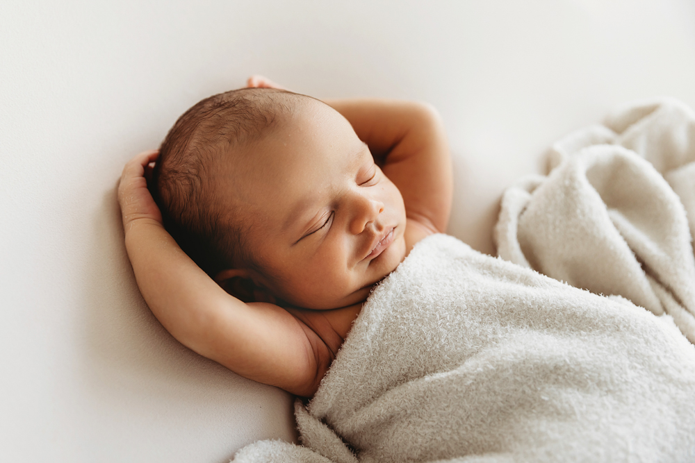 newborn sleeping natural pose