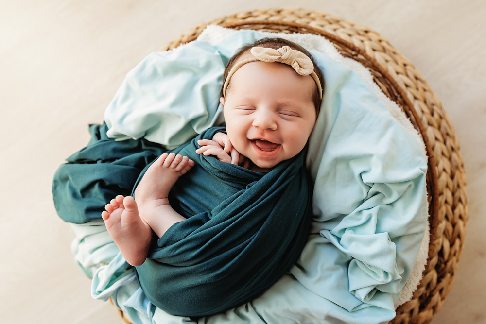 newborn baby smiling picture