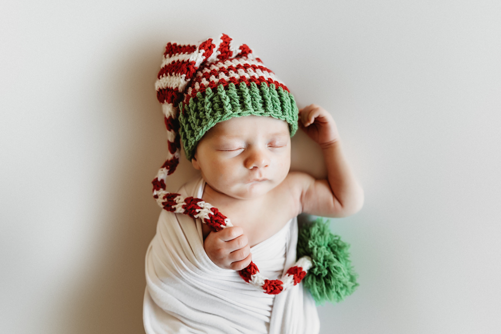 newborn baby with christmas hat