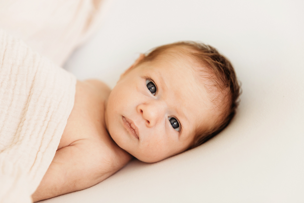 newborn baby with eyes open