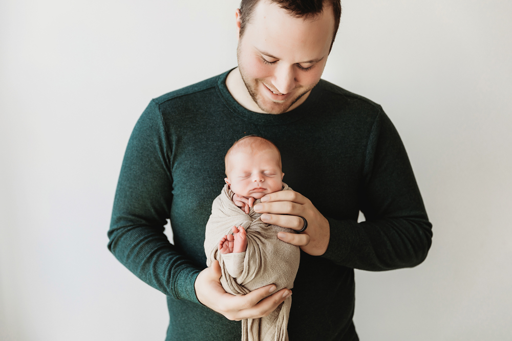 newborn baby with dad