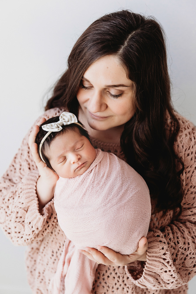 newborn baby with mom