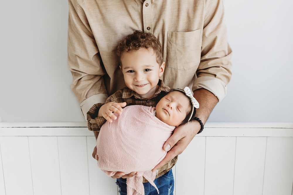 newborn baby with big brother