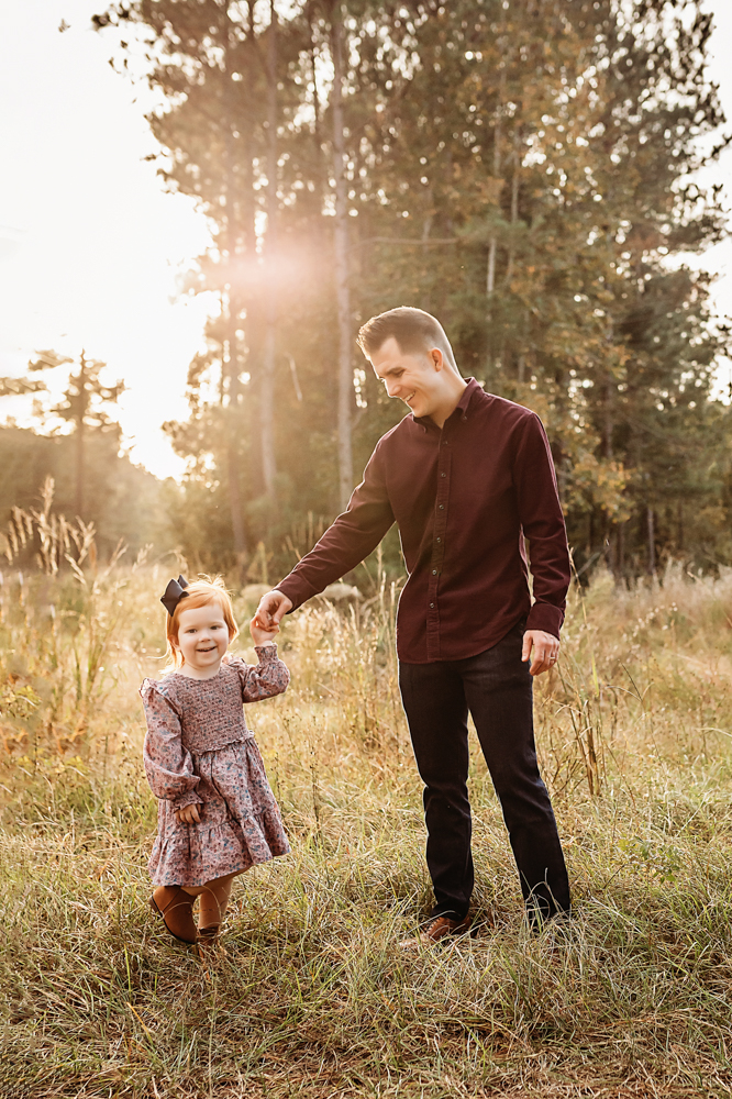 dad with daughter sunset picture