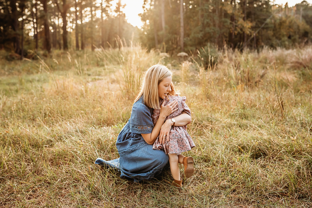 mom with daughter sunset picture