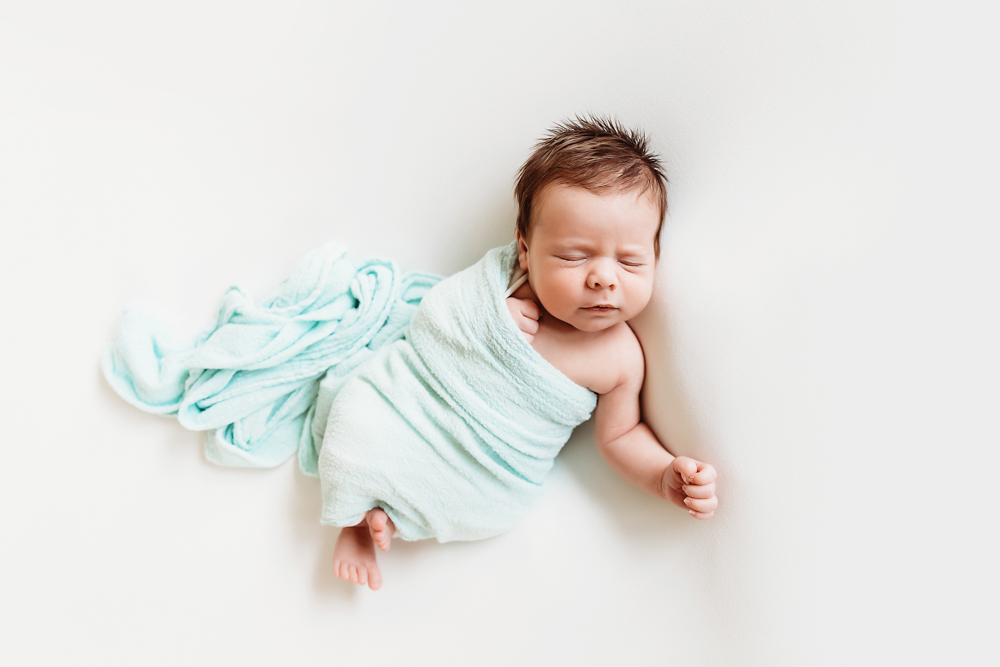 newborn baby relaxed pose