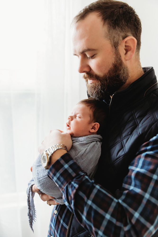 dad with newborn baby boy