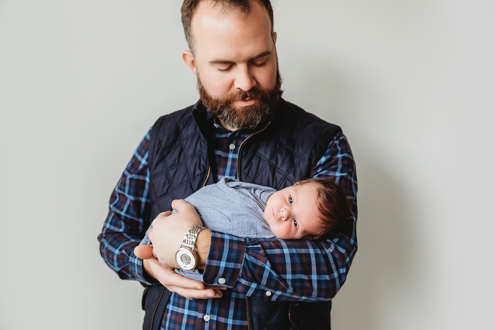 dad with newborn baby boy