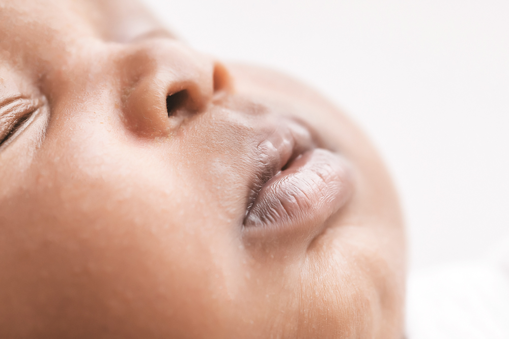 Newborn Lily macro profile of tiny nose and lips showing delicate newborn texture at Reflection Images by Tracy Rowell in Florence SC