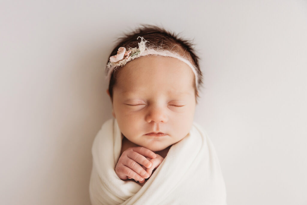 newborn baby swaddled