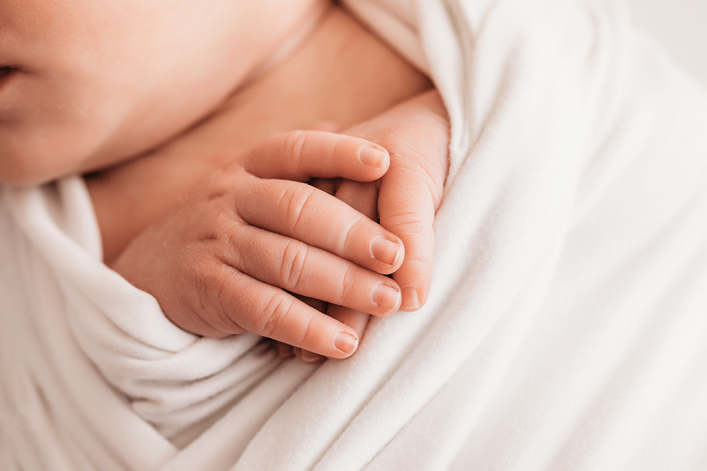 up close newborn baby fingers