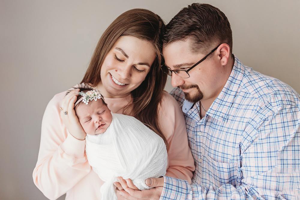 newborn baby with mom and dad