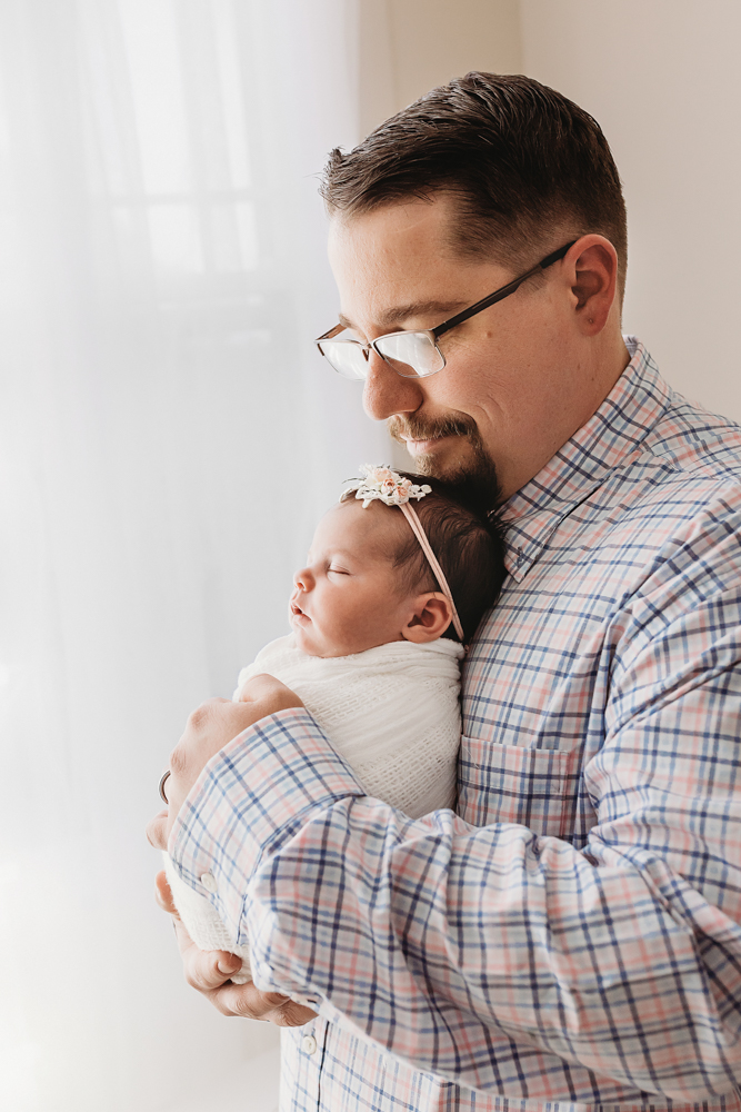 dad holding newborn baby south carolina