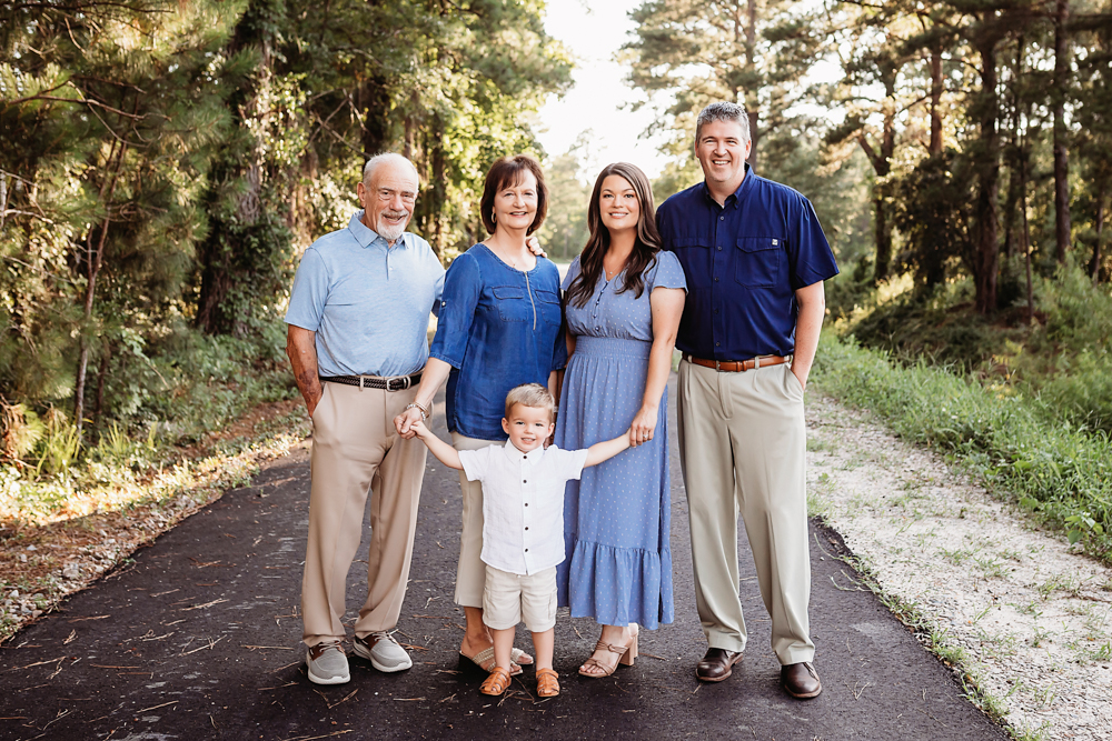 family pose evening with natural light, smiles, and love at Reflection Images by Tracy Rowell in Florence SC