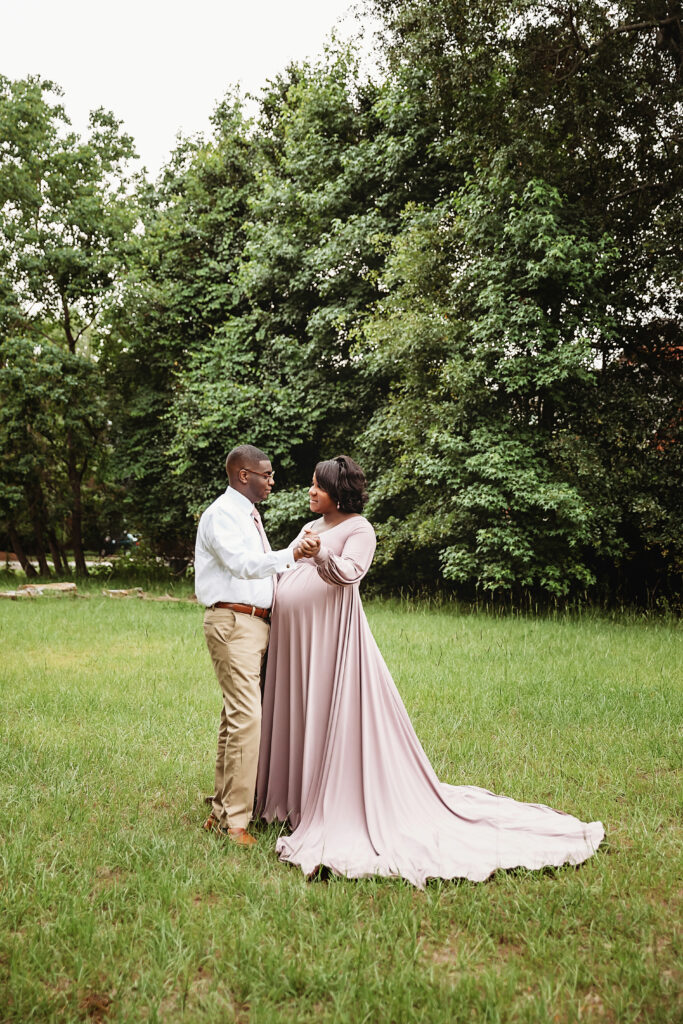 Couple dancing in field, mauve gown flowing at Reflection Images by Tracy Rowell in Florence SC
