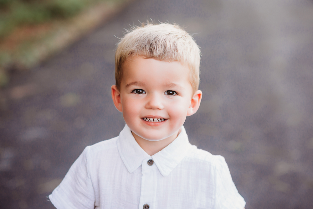 golden hour little-boy candid with natural light, smiles, and love at Reflection Images by Tracy Rowell in Florence SC
