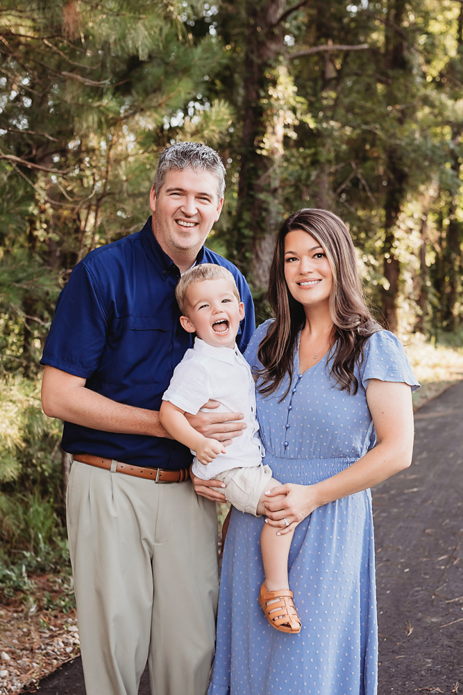 family hug path with natural light, smiles, and love at Reflection Images by Tracy Rowell in Florence SC