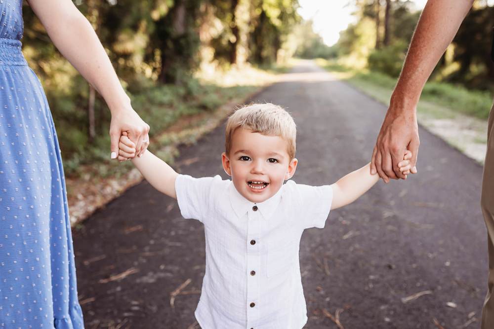 hand in hand close with natural light, smiles, and love at Reflection Images by Tracy Rowell in Florence SC