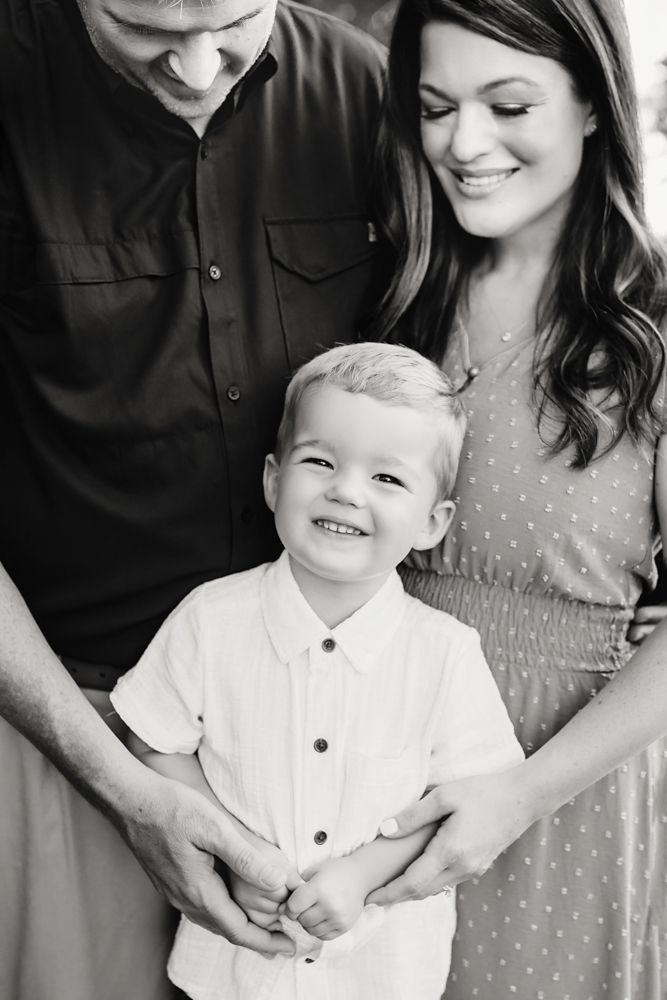 mid laugh family with natural light, smiles, and love at Reflection Images by Tracy Rowell in Florence SC