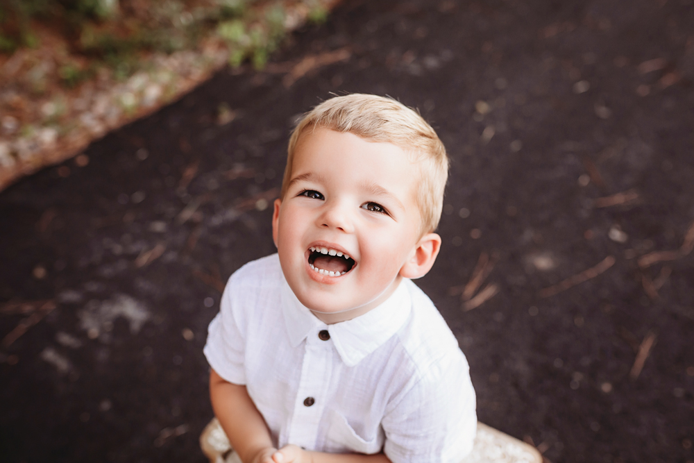 young boy dash with natural light, smiles, and love at Reflection Images by Tracy Rowell in Florence SC
