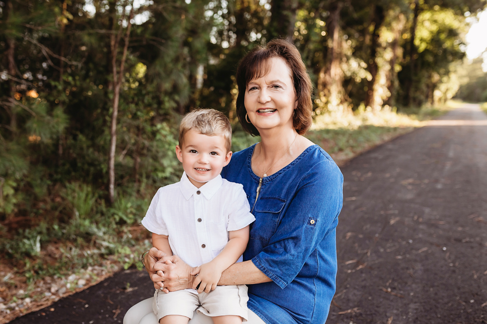 wooded path giggle with natural light, smiles, and love at Reflection Images by Tracy Rowell in Florence SC