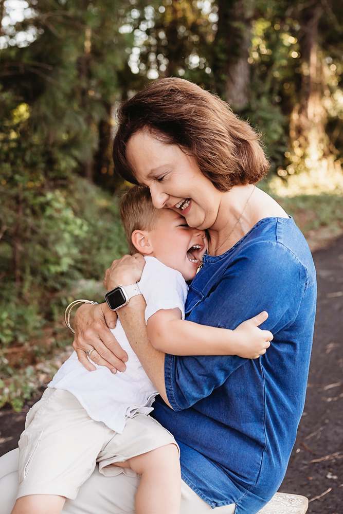 candid backlit laugh with natural light, smiles, and love at Reflection Images by Tracy Rowell in Florence SC