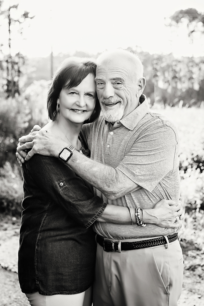 blackwhite couple serene with natural light, smiles, and love at Reflection Images by Tracy Rowell in Florence SC