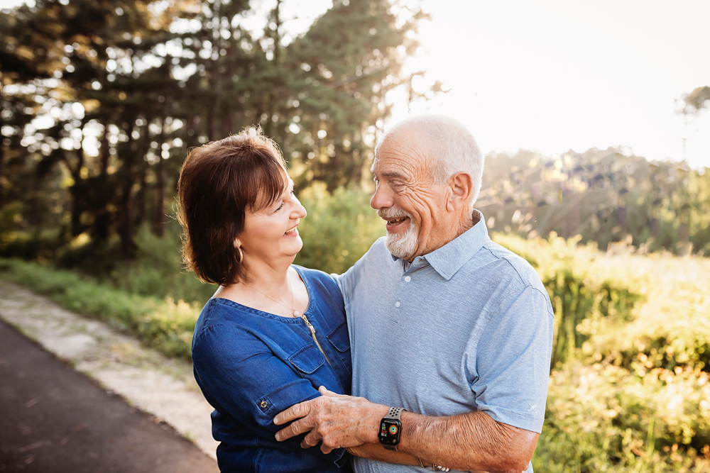 couple path pose with natural light, smiles, and love at Reflection Images by Tracy Rowell in Florence SC