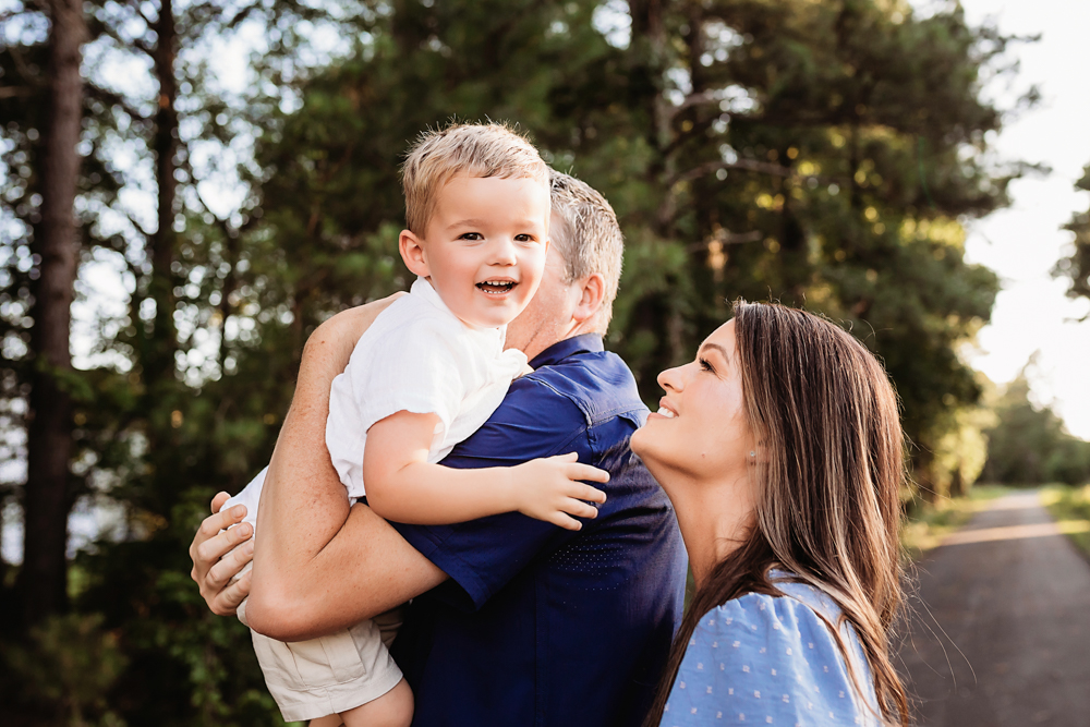 over shoulder grin with natural light, smiles, and love at Reflection Images by Tracy Rowell in Florence SC