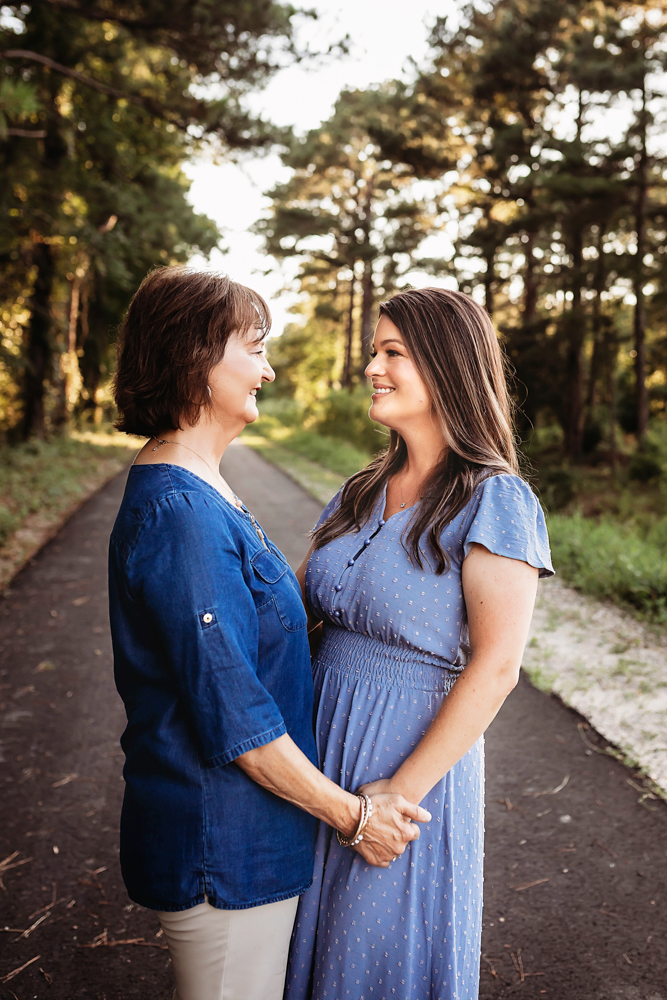 mom grandma hug with natural light, smiles, and love at Reflection Images by Tracy Rowell in Florence SC