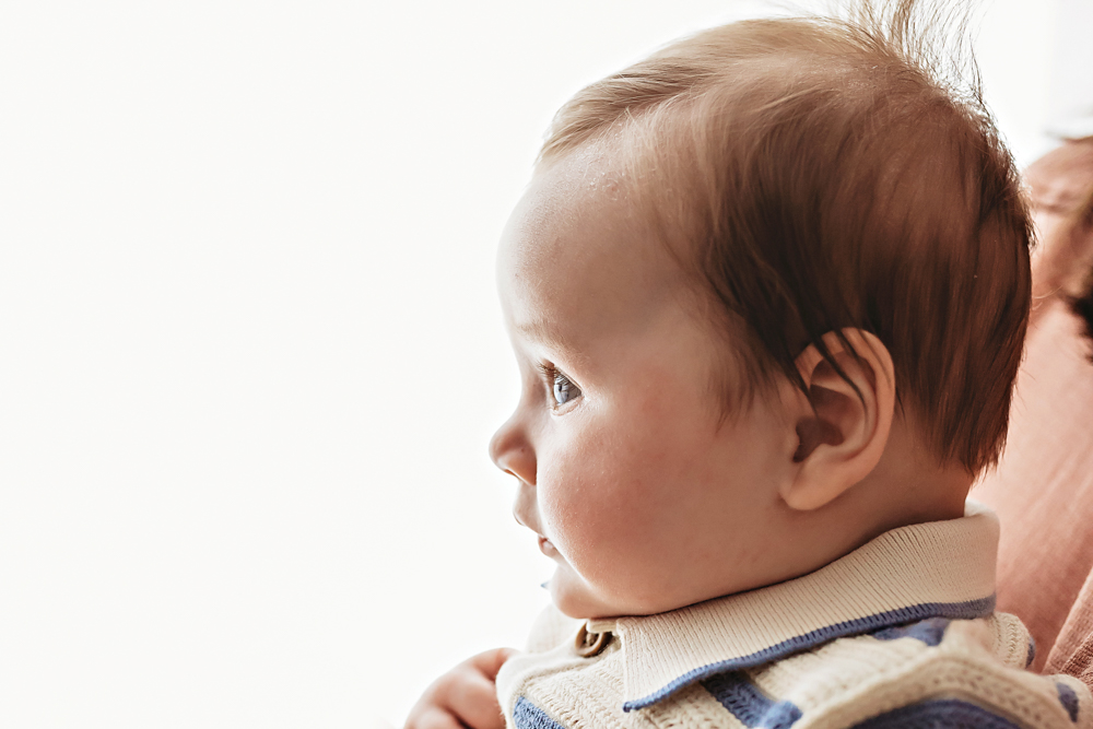 Side profile of baby in natural light, milestone session near Florence SC