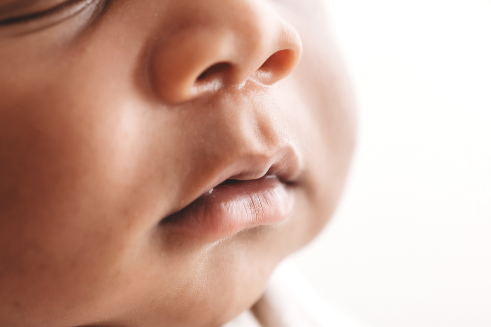 Macro close-up of Braylens lips and nose with soft studio lighting at Reflection Images by Tracy Rowell in Florence SC