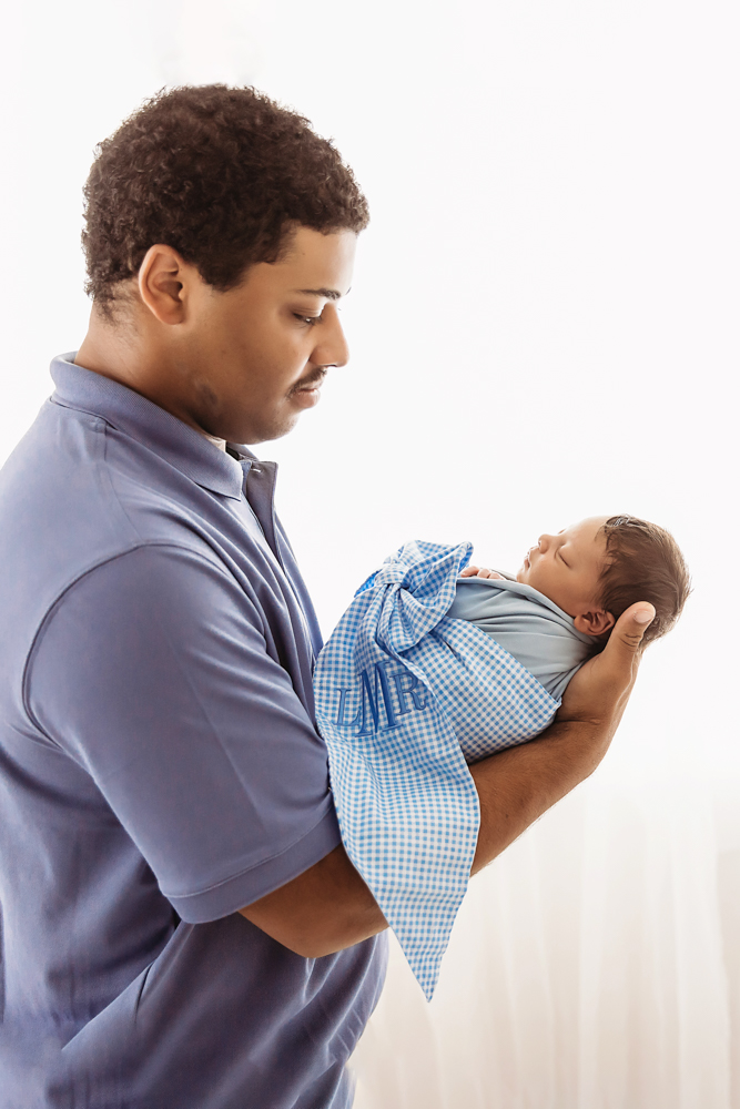 dad holding baby blue wrap florence sc