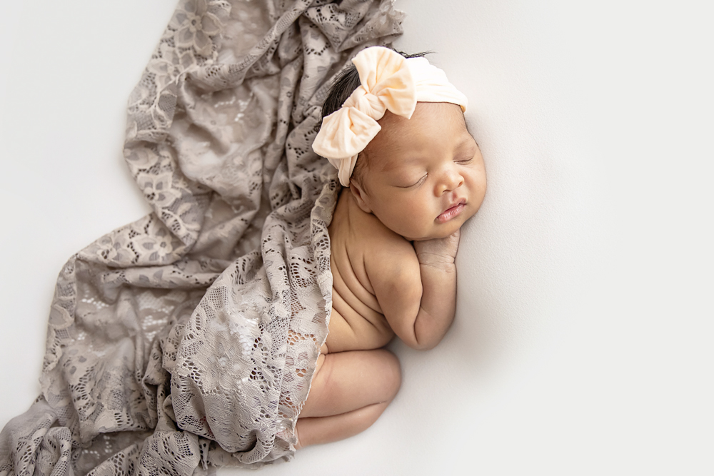 african american sleeping newborn baby professional photography studio