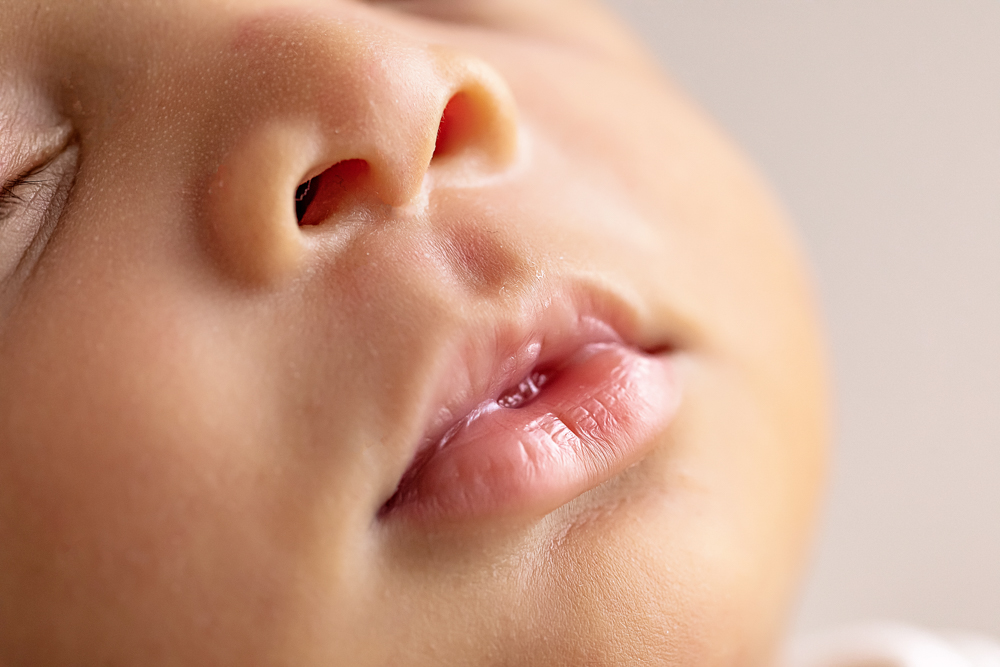 up close newborn baby lips