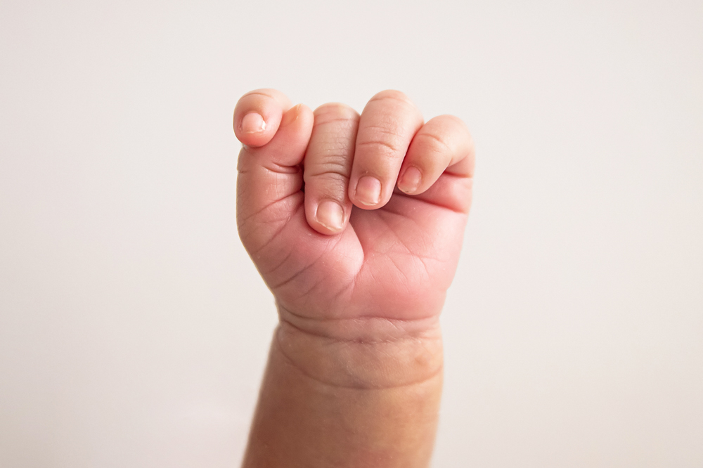tiny baby hand image