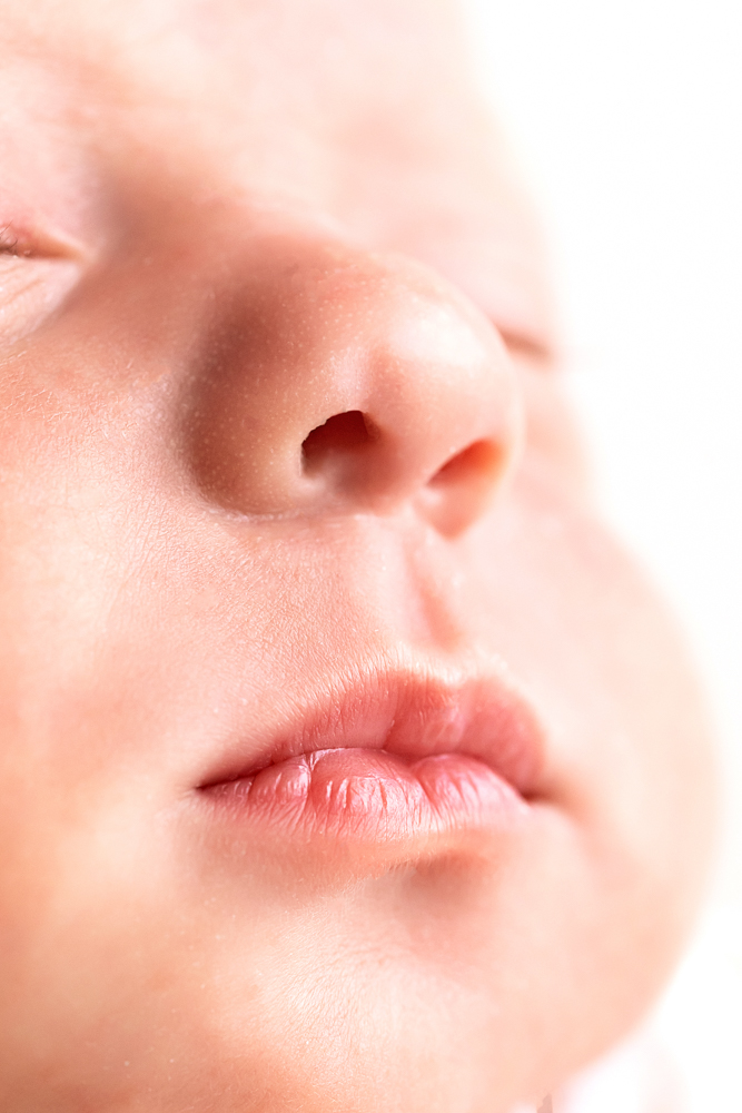 macro of newborn lips and nose soft skin texture Florence SC Reflection Images by Tracy Rowell