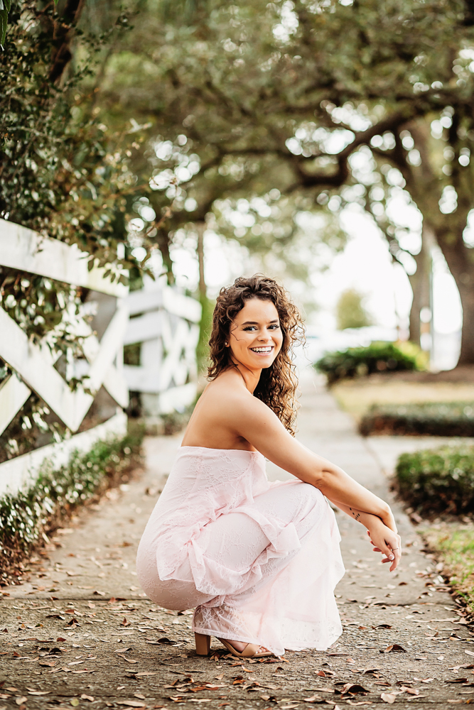 hayden sitting in pink dress photography session reflection images in Georgetown SC