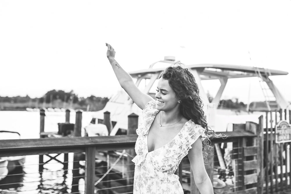 black and white portrait of hayden with windblown curls smiling Georgetown SC