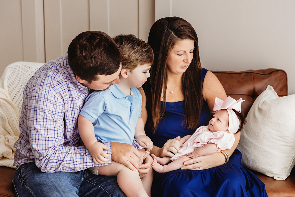 Baby Logan family snuggle at Reflection Images by Tracy Rowell in Florence SC