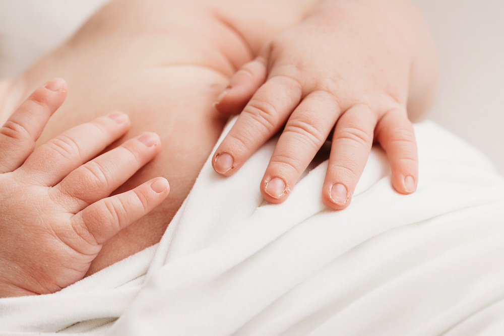 Baby Logan gentle hands at Reflection Images by Tracy Rowell in Florence SC
